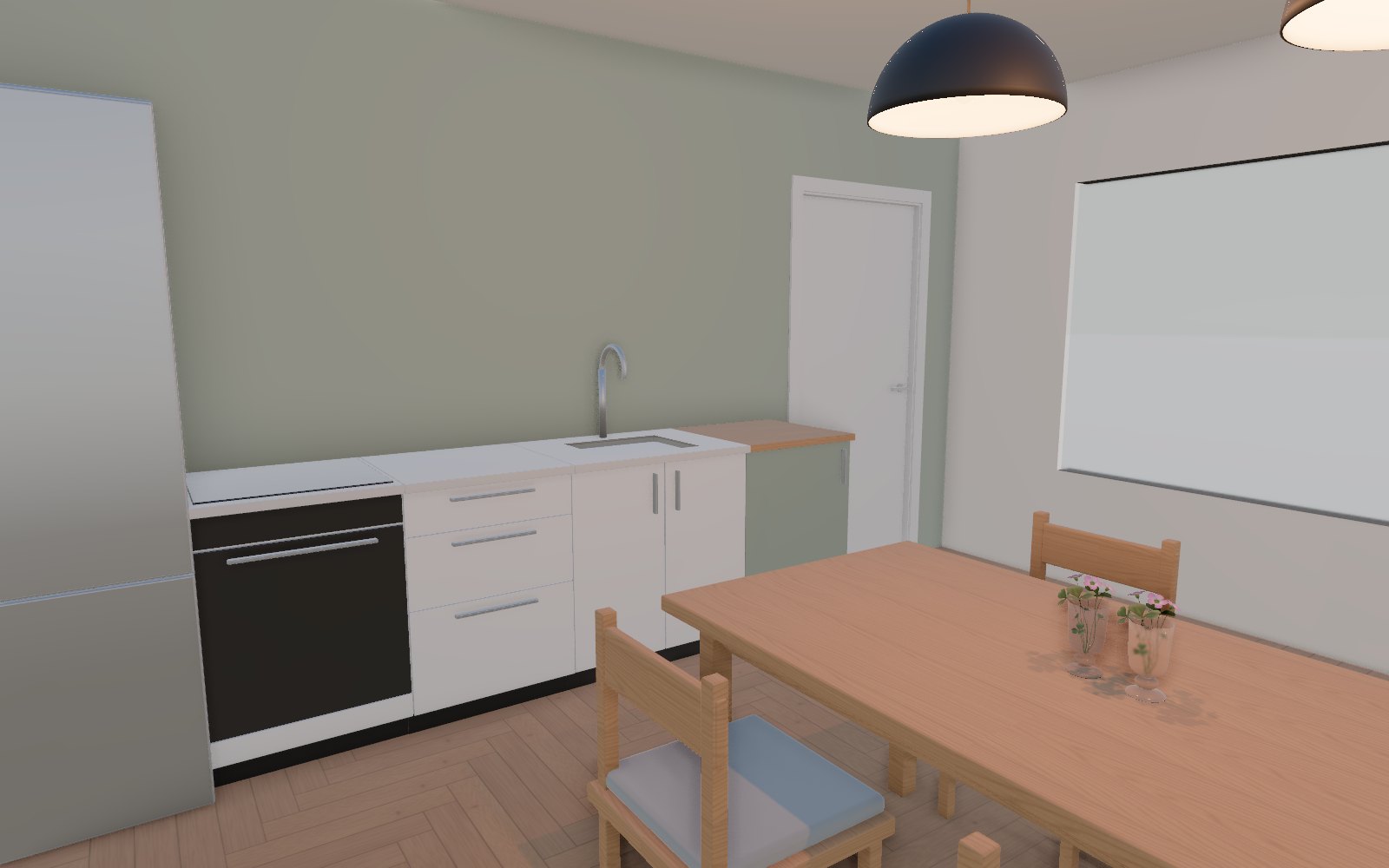 A kitchen with a sage green wall, white units and an oak herringbone floor, with the dining table in front